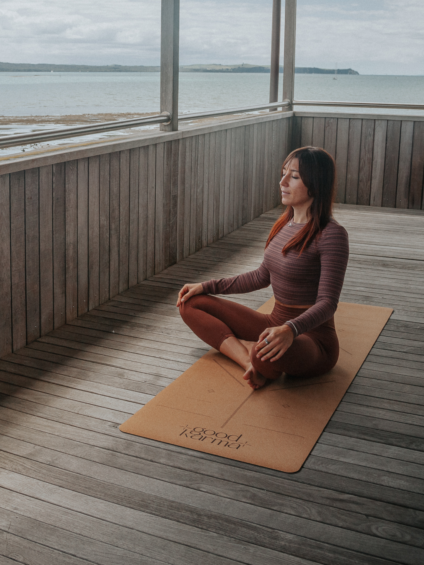 Good Karma cork yoga mat with body alinement Girl on the cork yoga mat doing yoga