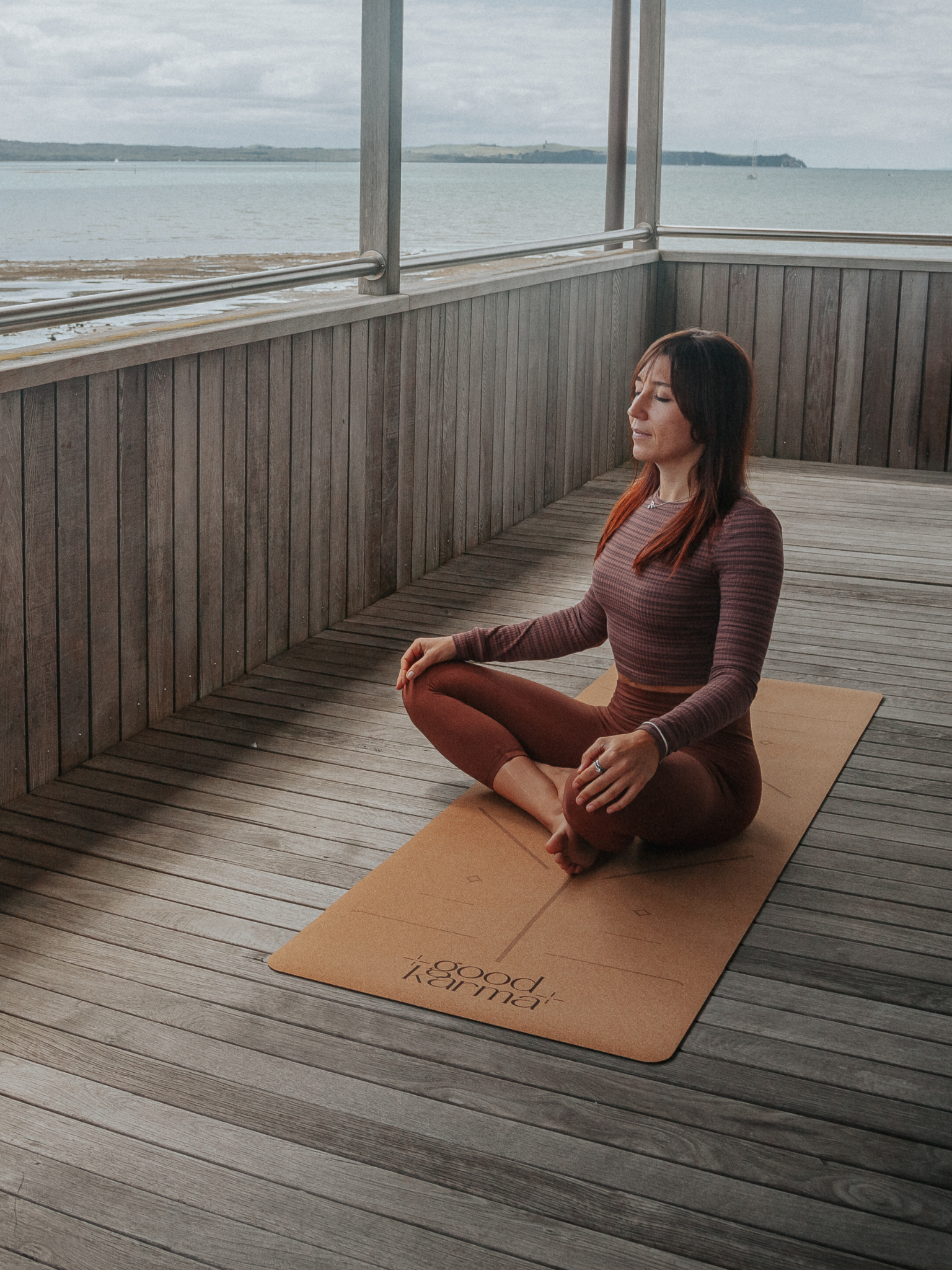 Good Karma cork yoga mat with body alinement  Girl on the cork yoga mat doing yoga