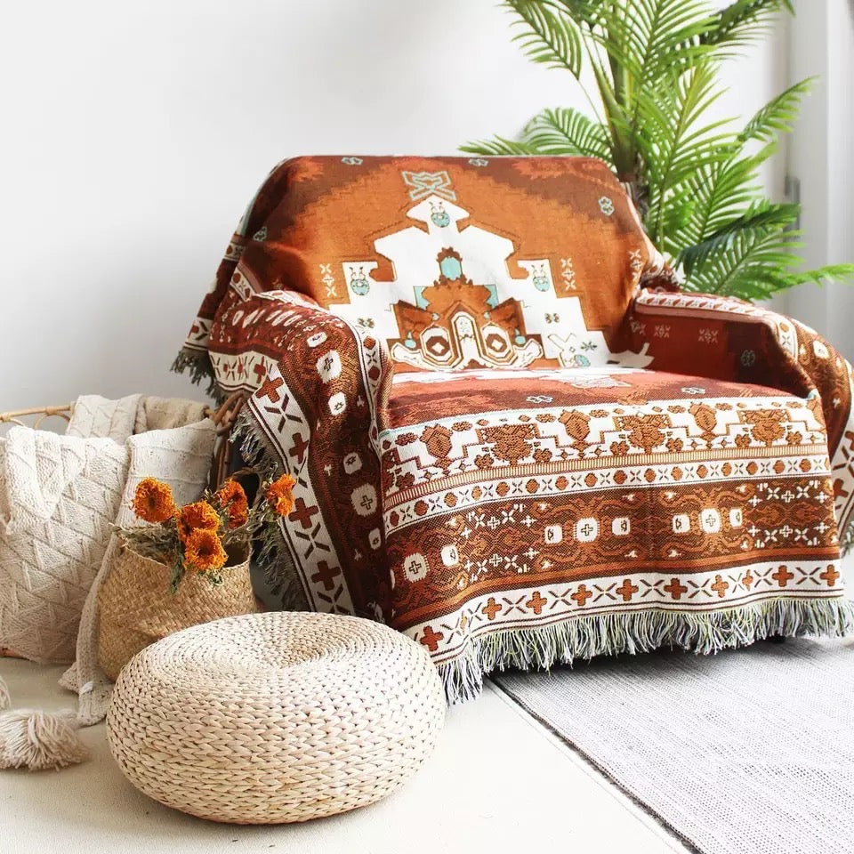 Morocan pattern Woven Boho Quilt Colorful Bohemian Tapestries with tassels covering the chair