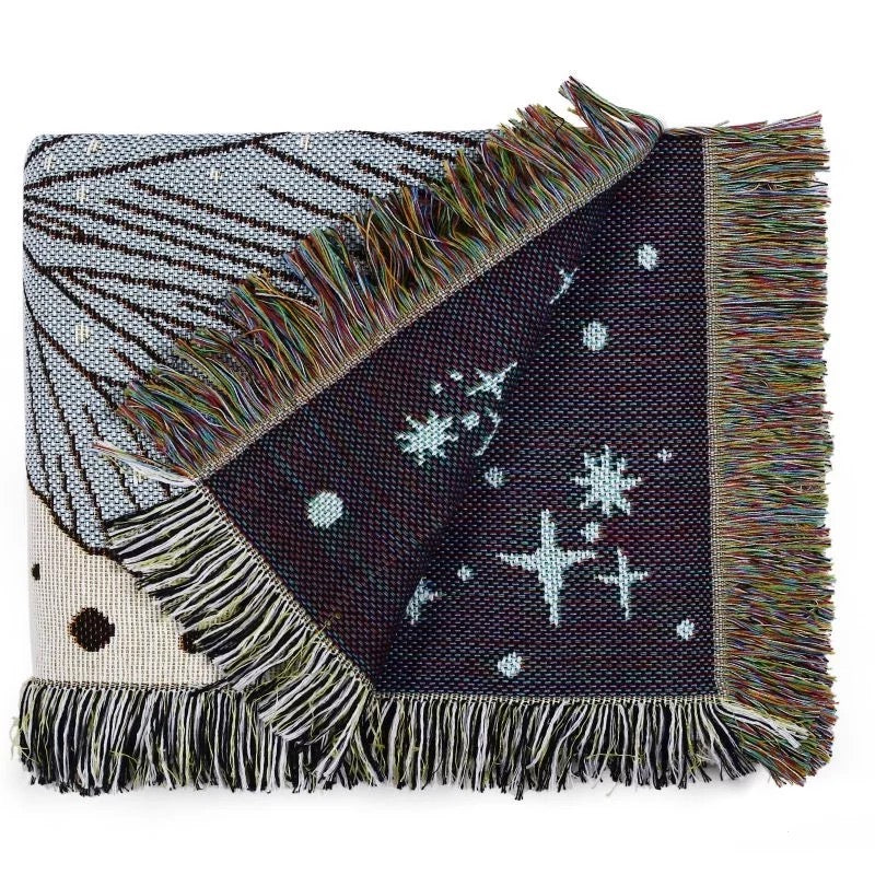 Woven Bohemian Quilt with Colorful Butterflies pattern Modern boho tapestry with tassels folded and the corner is open